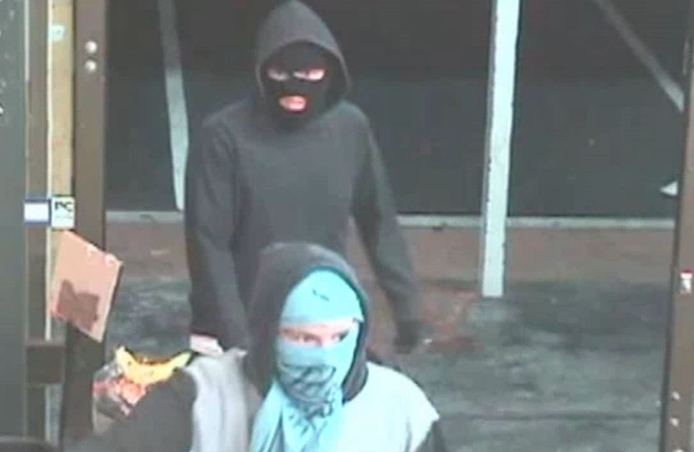 Two male offenders described as Caucasian, around 6’ tall (183cm), wearing black hooded jumpers with their faces covered, one using a balaclava and the other a T-shirt.