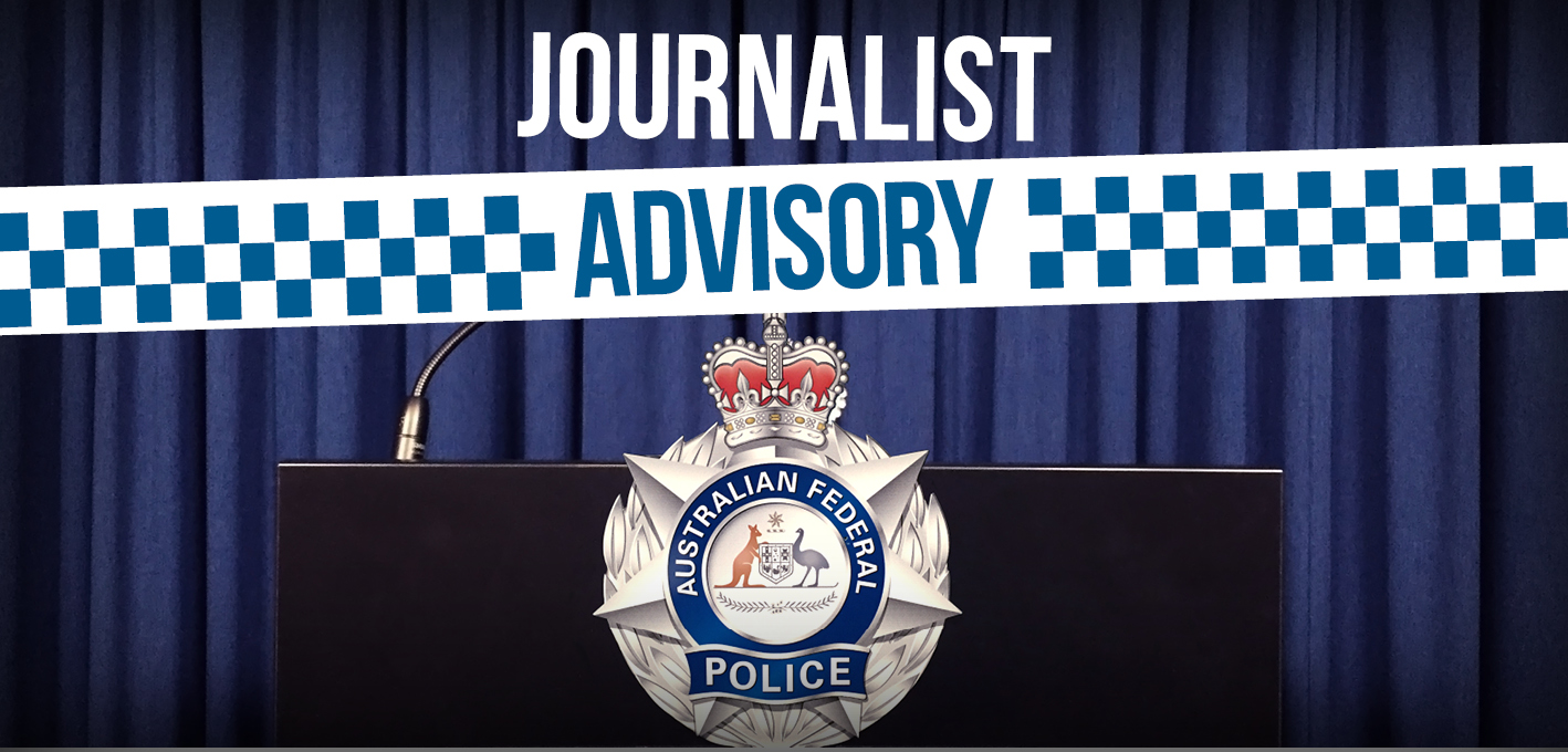 Image of a lecturn with AFP badge on the front with the words journalist advisory