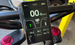 Speedo of e-scooter showing max speed 105kmh