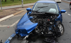 Collision-damaged Mazda 2