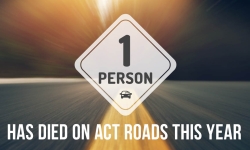 Banner that reads one person has died on ACT roads this year
