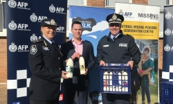 AFP Assistant Commissioner Debbie Platz, Capitol Chilled Foods Australia Bradley Clarke and ACT Policing Chief Police Officer Ray Johnson.