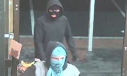 Two male offenders described as Caucasian, around 6’ tall (183cm), wearing black hooded jumpers with their faces covered, one using a balaclava and the other a T-shirt.