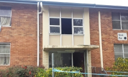 A crime scene is established at Stuart Flats in Griffith following a fire