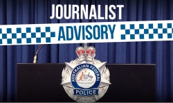 Image of a lecturn with AFP badge on the front with the words journalist advisory