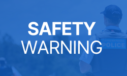 blue background with white writing reading "safety warning"